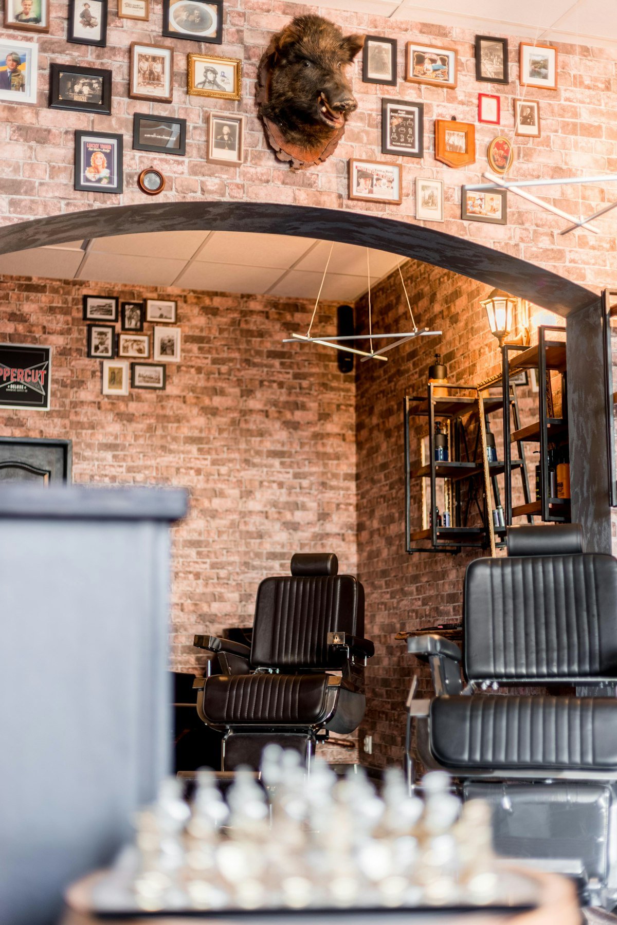 The barber chair and mirror inside the shop